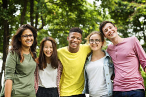 A group of teenagers congregating for the church's Youth Ministry